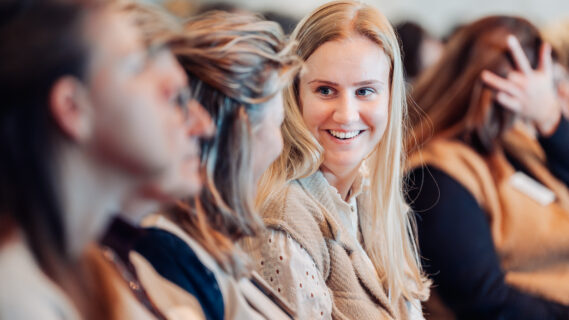 Foto van deelnemer sop een congres
